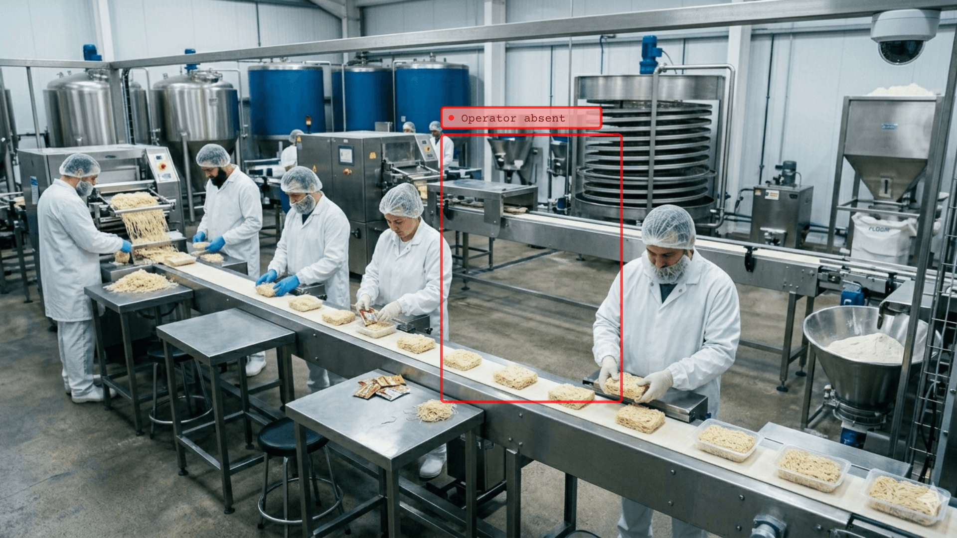 Workers processing food in factory